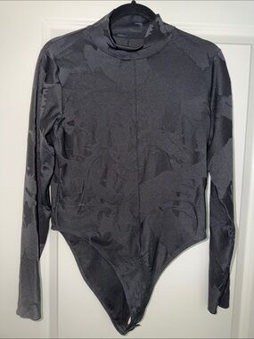 Nike Women’s Tech Black Camo Print  Long-Sleeve Bodysuit